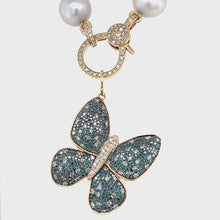 Load and play video in Gallery viewer, 14kg Blue and White Diamond Butterfly Pendant
